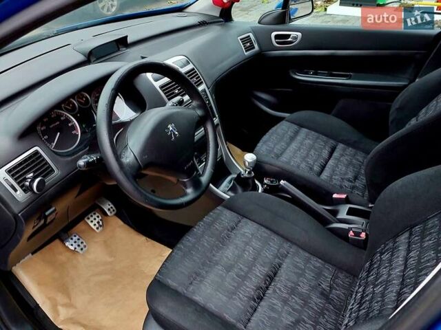 Синий Пежо 307, объемом двигателя 2 л и пробегом 265 тыс. км за 3550 $, фото 6 на Automoto.ua