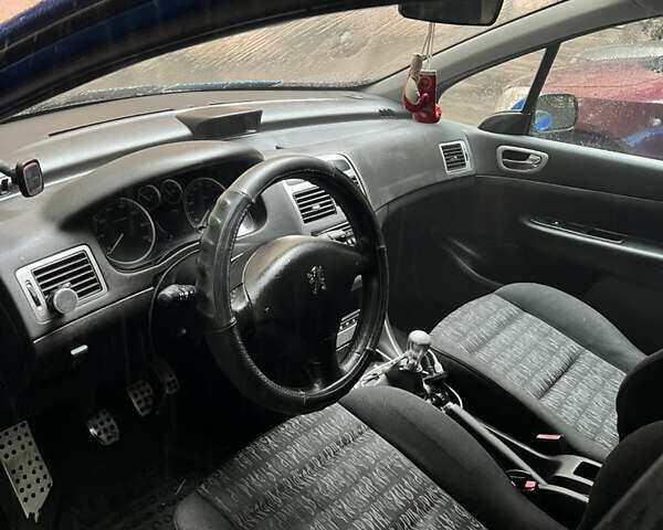 Синий Пежо 307, объемом двигателя 2 л и пробегом 260 тыс. км за 3800 $, фото 4 на Automoto.ua