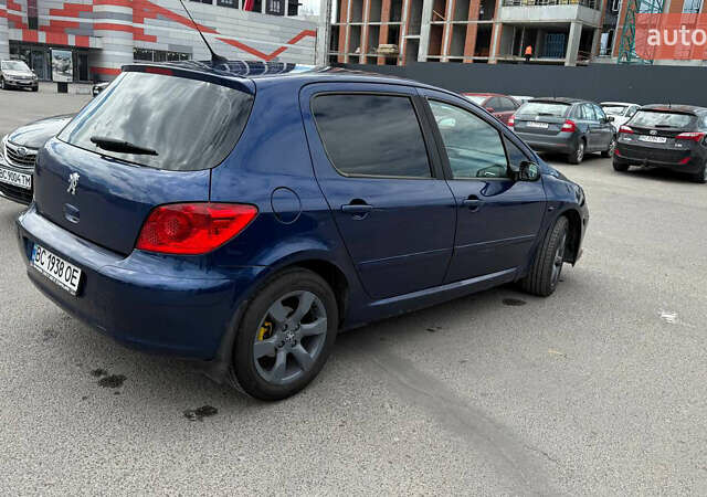 Синий Пежо 307, объемом двигателя 2 л и пробегом 300 тыс. км за 3499 $, фото 4 на Automoto.ua
