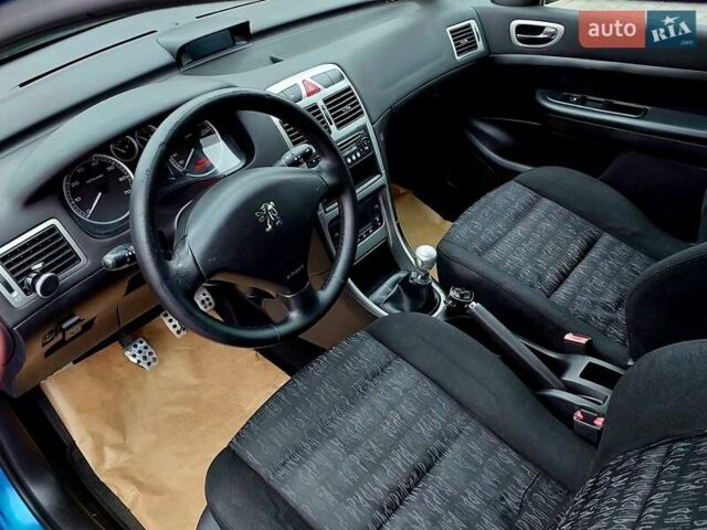 Синий Пежо 307, объемом двигателя 2 л и пробегом 265 тыс. км за 3550 $, фото 7 на Automoto.ua