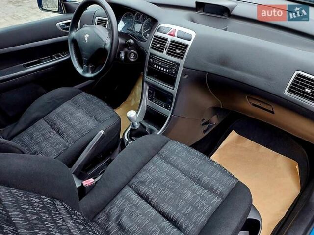 Синий Пежо 307, объемом двигателя 2 л и пробегом 265 тыс. км за 3550 $, фото 8 на Automoto.ua