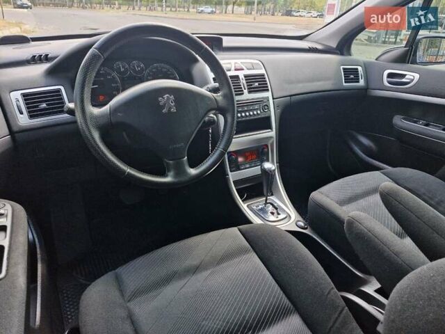 Синий Пежо 307, объемом двигателя 2 л и пробегом 81 тыс. км за 6499 $, фото 14 на Automoto.ua