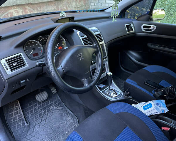 Синий Пежо 307, объемом двигателя 1.59 л и пробегом 199 тыс. км за 4800 $, фото 8 на Automoto.ua