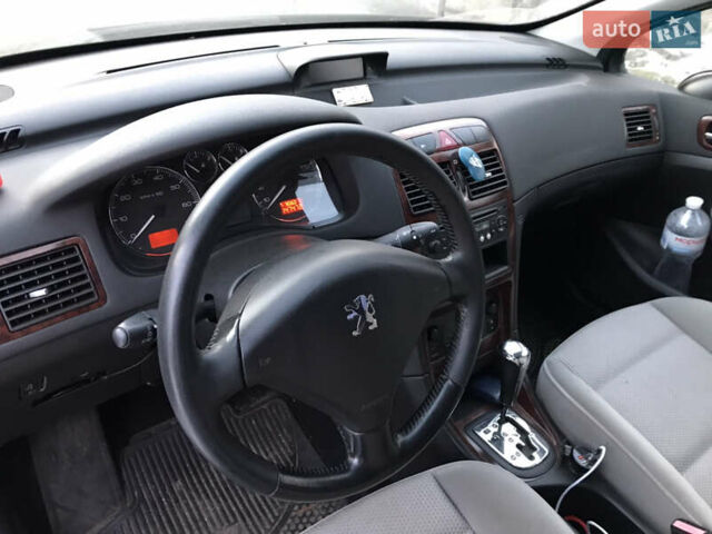 Синий Пежо 307, объемом двигателя 2 л и пробегом 147 тыс. км за 5700 $, фото 1 на Automoto.ua