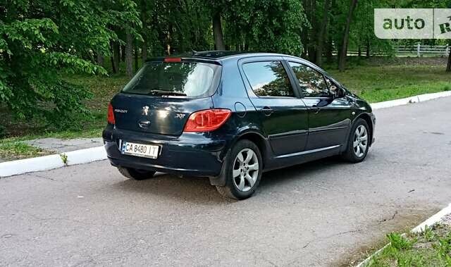 Синій Пежо 307, об'ємом двигуна 2 л та пробігом 243 тис. км за 4200 $, фото 31 на Automoto.ua