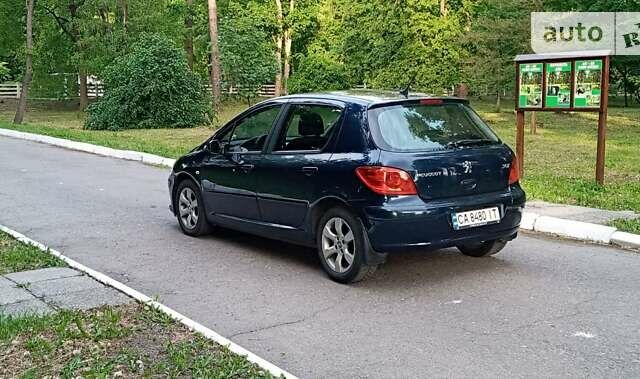 Синій Пежо 307, об'ємом двигуна 2 л та пробігом 243 тис. км за 4200 $, фото 30 на Automoto.ua