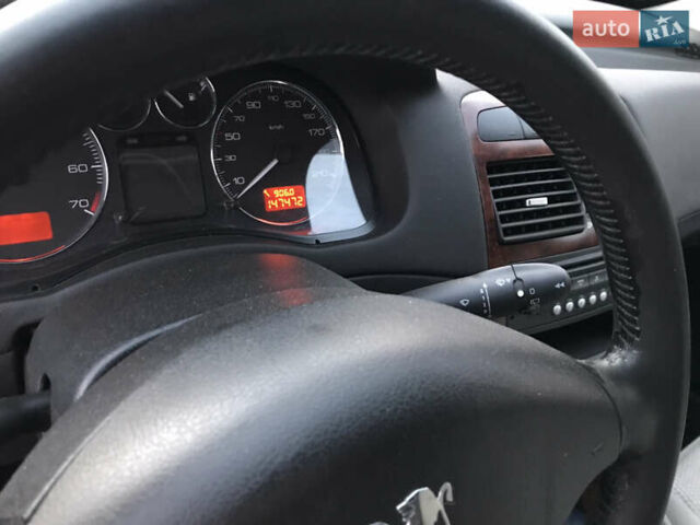 Синий Пежо 307, объемом двигателя 2 л и пробегом 147 тыс. км за 5700 $, фото 2 на Automoto.ua