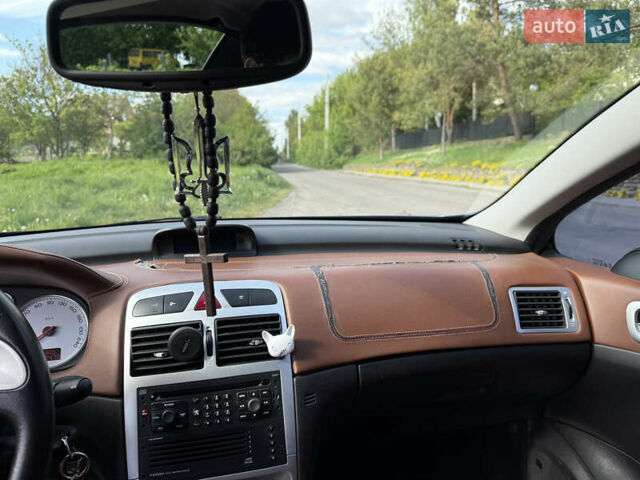 Синій Пежо 307, об'ємом двигуна 2 л та пробігом 227 тис. км за 4800 $, фото 32 на Automoto.ua