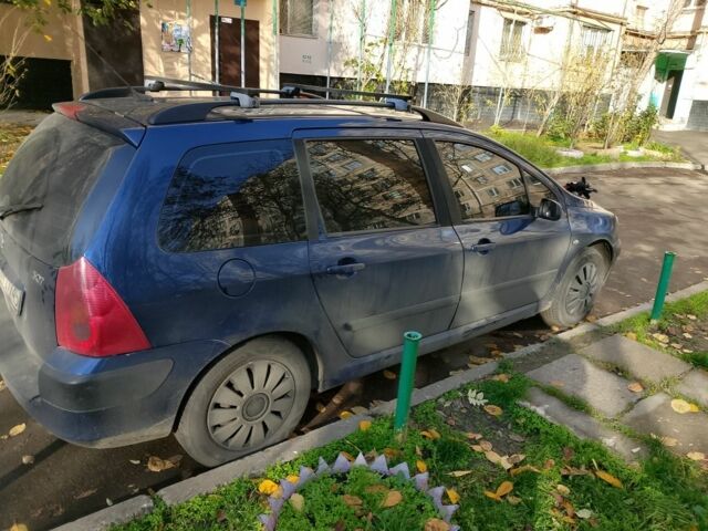 Синий Пежо 307, объемом двигателя 1.6 л и пробегом 311 тыс. км за 2800 $, фото 4 на Automoto.ua