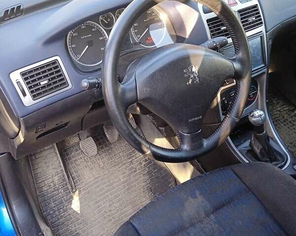 Синий Пежо 307, объемом двигателя 1.4 л и пробегом 261 тыс. км за 3600 $, фото 7 на Automoto.ua