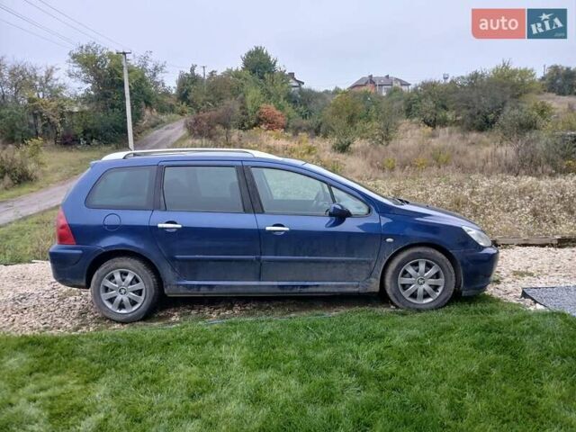 Синий Пежо 307, объемом двигателя 1.59 л и пробегом 200 тыс. км за 3800 $, фото 2 на Automoto.ua