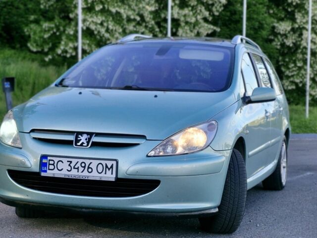 Синий Пежо 307, объемом двигателя 2 л и пробегом 260 тыс. км за 3850 $, фото 1 на Automoto.ua