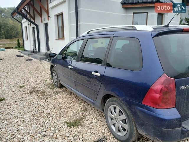 Синий Пежо 307, объемом двигателя 1.59 л и пробегом 200 тыс. км за 3800 $, фото 4 на Automoto.ua