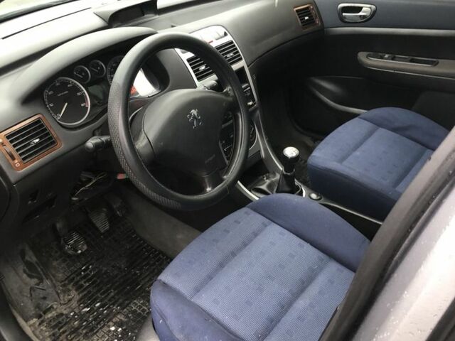 Синій Пежо 307, об'ємом двигуна 2 л та пробігом 380 тис. км за 3100 $, фото 8 на Automoto.ua