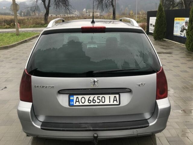Синій Пежо 307, об'ємом двигуна 2 л та пробігом 380 тис. км за 3100 $, фото 5 на Automoto.ua