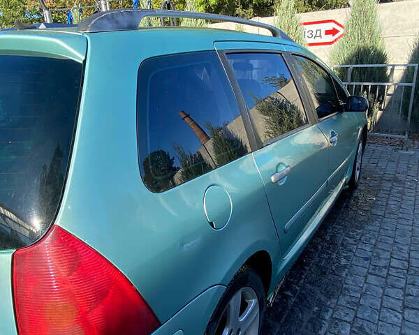 Синий Пежо 307, объемом двигателя 2 л и пробегом 320 тыс. км за 2700 $, фото 1 на Automoto.ua