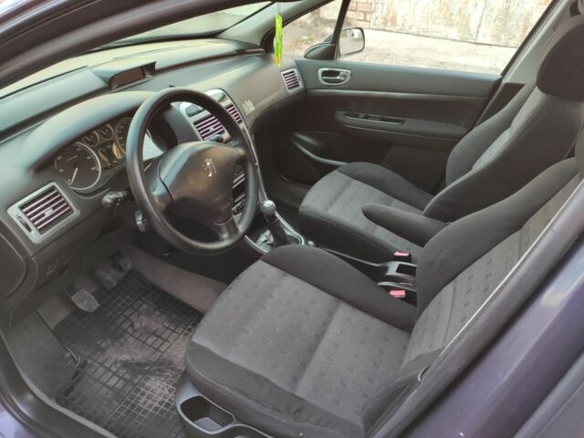 Синій Пежо 307, об'ємом двигуна 2 л та пробігом 466 тис. км за 3400 $, фото 4 на Automoto.ua