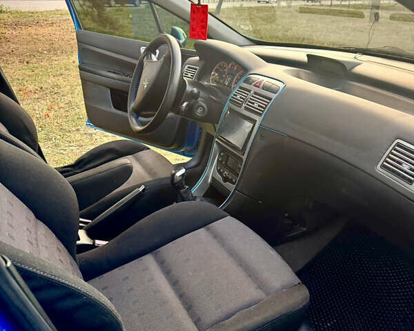 Синий Пежо 307, объемом двигателя 1.59 л и пробегом 336 тыс. км за 5000 $, фото 13 на Automoto.ua