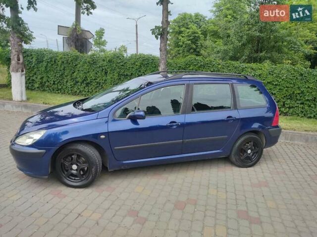 Синий Пежо 307, объемом двигателя 1.59 л и пробегом 267 тыс. км за 4100 $, фото 1 на Automoto.ua