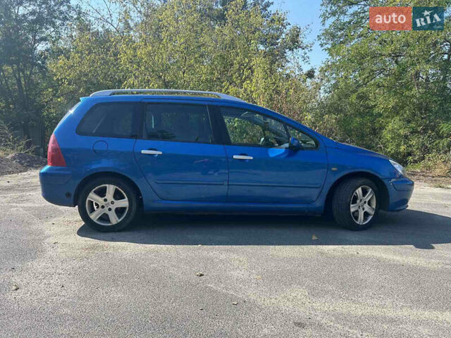 Синий Пежо 307, объемом двигателя 2 л и пробегом 300 тыс. км за 3400 $, фото 2 на Automoto.ua
