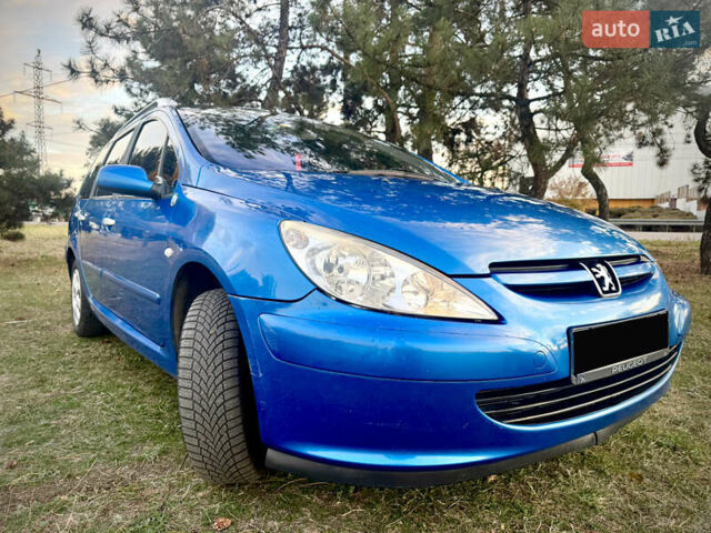 Синий Пежо 307, объемом двигателя 1.59 л и пробегом 336 тыс. км за 5000 $, фото 1 на Automoto.ua
