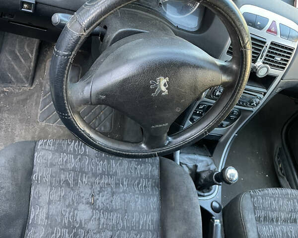 Синий Пежо 307, объемом двигателя 1.6 л и пробегом 300 тыс. км за 2800 $, фото 6 на Automoto.ua