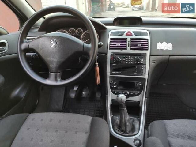 Синій Пежо 307, об'ємом двигуна 2 л та пробігом 467 тис. км за 3500 $, фото 4 на Automoto.ua