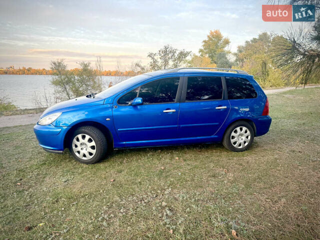Синий Пежо 307, объемом двигателя 1.59 л и пробегом 336 тыс. км за 5000 $, фото 5 на Automoto.ua