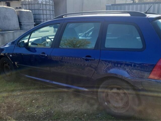 Синий Пежо 307, объемом двигателя 1.6 л и пробегом 200 тыс. км за 1500 $, фото 2 на Automoto.ua