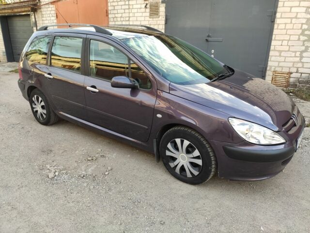 Синій Пежо 307, об'ємом двигуна 2 л та пробігом 466 тис. км за 3400 $, фото 3 на Automoto.ua