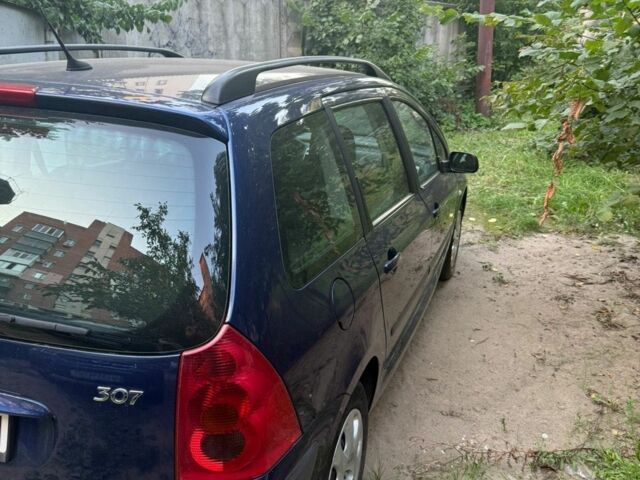 Синий Пежо 307, объемом двигателя 1.6 л и пробегом 270 тыс. км за 2300 $, фото 5 на Automoto.ua