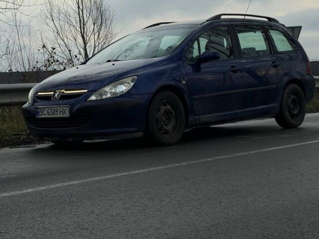 Синий Пежо 307, объемом двигателя 2 л и пробегом 320 тыс. км за 2699 $, фото 1 на Automoto.ua