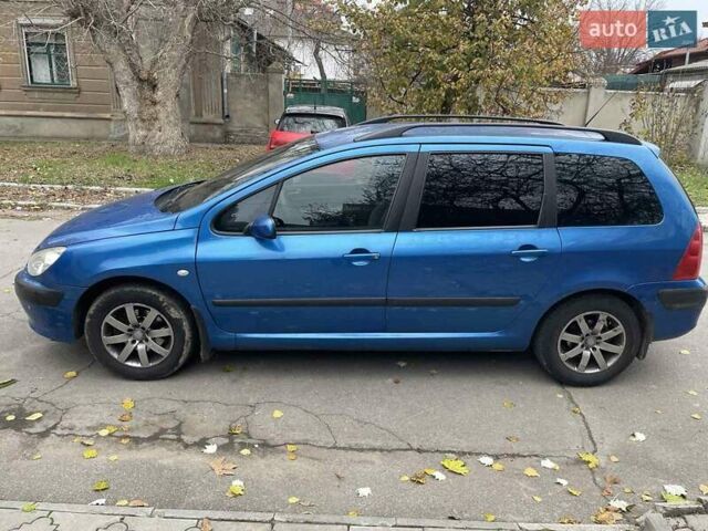 Синий Пежо 307, объемом двигателя 1.6 л и пробегом 150 тыс. км за 4900 $, фото 3 на Automoto.ua