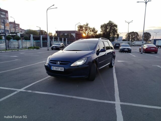 Синий Пежо 307, объемом двигателя 2 л и пробегом 250 тыс. км за 6300 $, фото 1 на Automoto.ua
