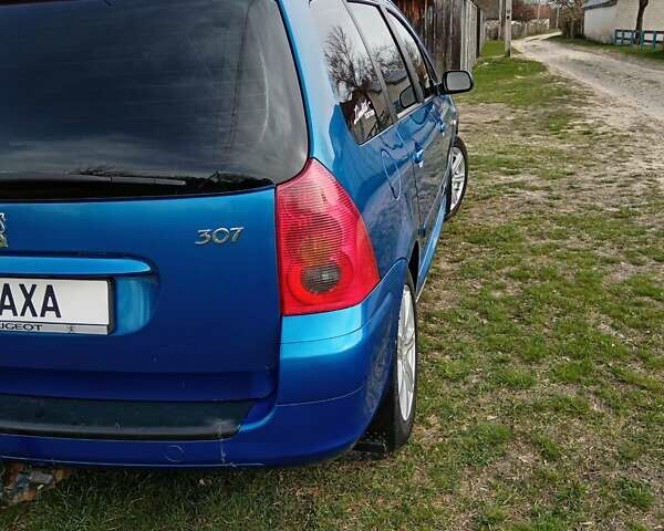 Синий Пежо 307, объемом двигателя 1.6 л и пробегом 348 тыс. км за 4000 $, фото 3 на Automoto.ua