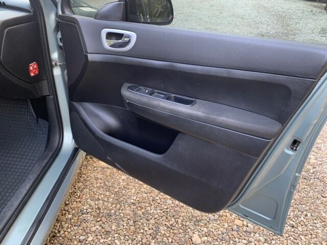 Синий Пежо 307, объемом двигателя 2 л и пробегом 234 тыс. км за 4850 $, фото 13 на Automoto.ua