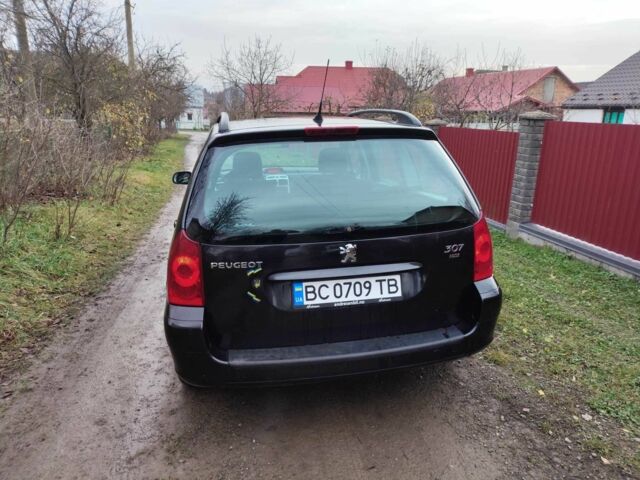 Синий Пежо 307, объемом двигателя 1.6 л и пробегом 214 тыс. км за 1999 $, фото 3 на Automoto.ua