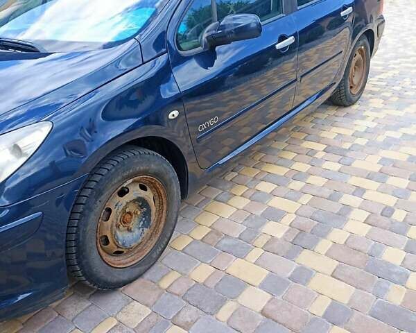 Синий Пежо 307, объемом двигателя 1.97 л и пробегом 356 тыс. км за 3690 $, фото 2 на Automoto.ua
