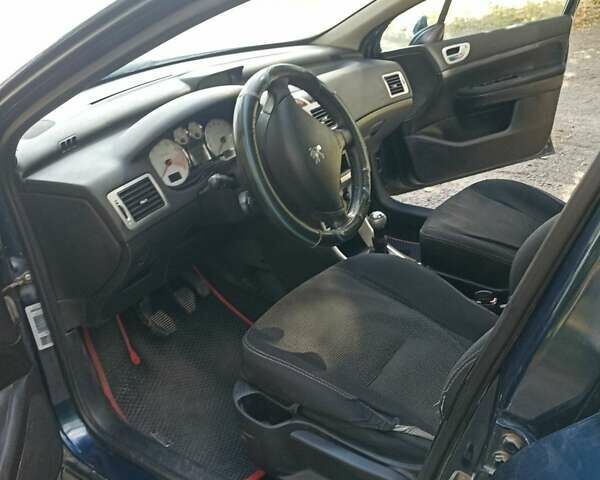Синий Пежо 307, объемом двигателя 1.97 л и пробегом 356 тыс. км за 3690 $, фото 10 на Automoto.ua