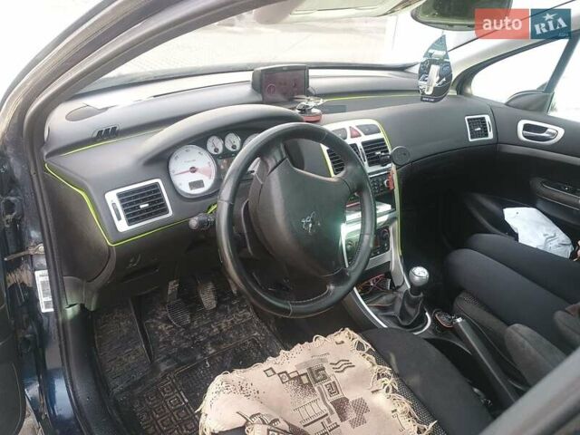 Синий Пежо 307, объемом двигателя 1.6 л и пробегом 280 тыс. км за 4900 $, фото 11 на Automoto.ua