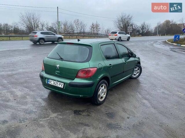 Зеленый Пежо 307, объемом двигателя 2 л и пробегом 424 тыс. км за 3000 $, фото 5 на Automoto.ua