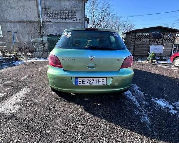 Зелений Пежо 307, об'ємом двигуна 2 л та пробігом 240 тис. км за 2600 $, фото 3 на Automoto.ua