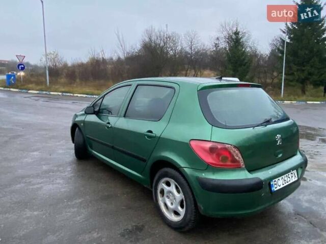 Зеленый Пежо 307, объемом двигателя 2 л и пробегом 424 тыс. км за 3000 $, фото 4 на Automoto.ua