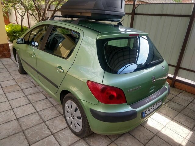 Зеленый Пежо 307, объемом двигателя 2 л и пробегом 270 тыс. км за 3000 $, фото 2 на Automoto.ua