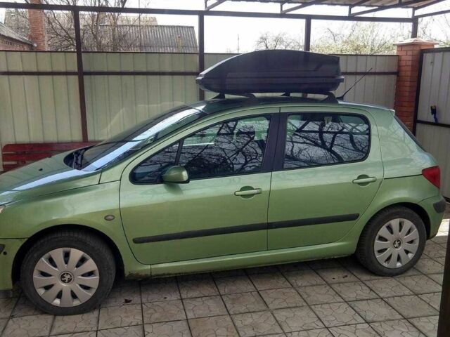 Зеленый Пежо 307, объемом двигателя 2 л и пробегом 270 тыс. км за 3000 $, фото 1 на Automoto.ua