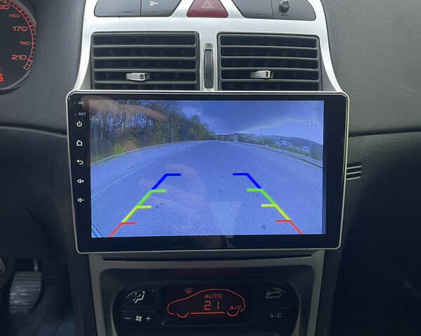 Зеленый Пежо 307, объемом двигателя 1.59 л и пробегом 228 тыс. км за 3399 $, фото 11 на Automoto.ua