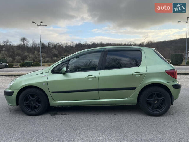 Зеленый Пежо 307, объемом двигателя 1.59 л и пробегом 228 тыс. км за 3399 $, фото 7 на Automoto.ua