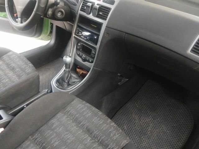 Зеленый Пежо 307, объемом двигателя 2 л и пробегом 270 тыс. км за 3000 $, фото 4 на Automoto.ua