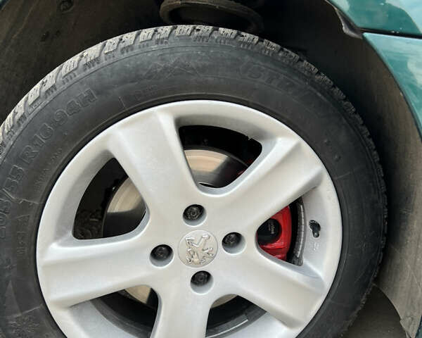 Зеленый Пежо 307, объемом двигателя 2 л и пробегом 200 тыс. км за 4000 $, фото 5 на Automoto.ua