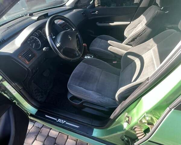 Зелений Пежо 307, об'ємом двигуна 2 л та пробігом 224 тис. км за 3400 $, фото 11 на Automoto.ua